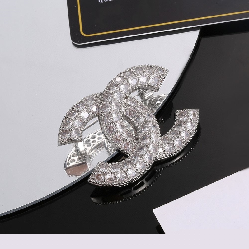 Ch*el brooches